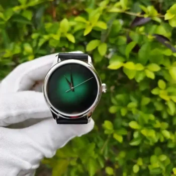 Close-up of black dial Tophill mechanical watch with calendar