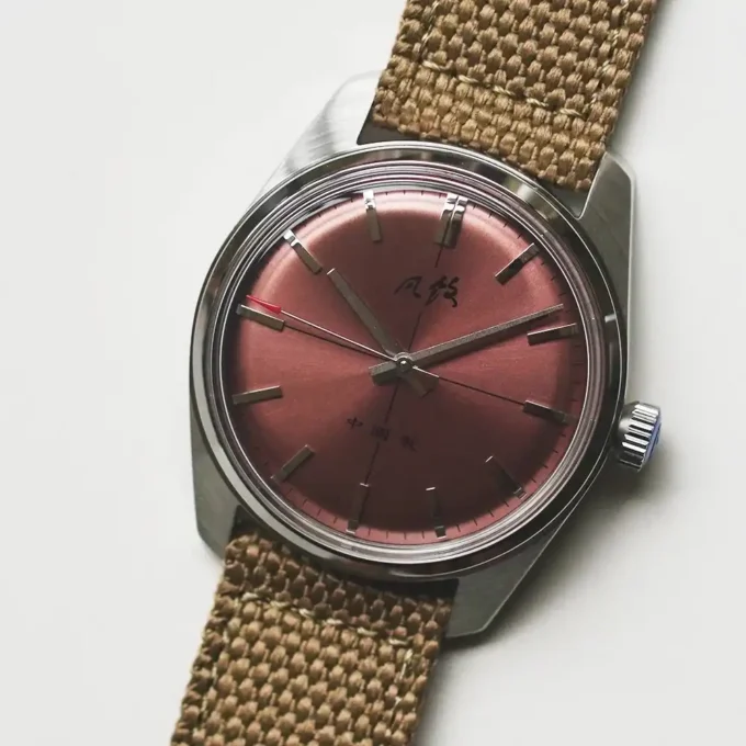 Wrist shot of Merkur Cross Line watch with casual outfit